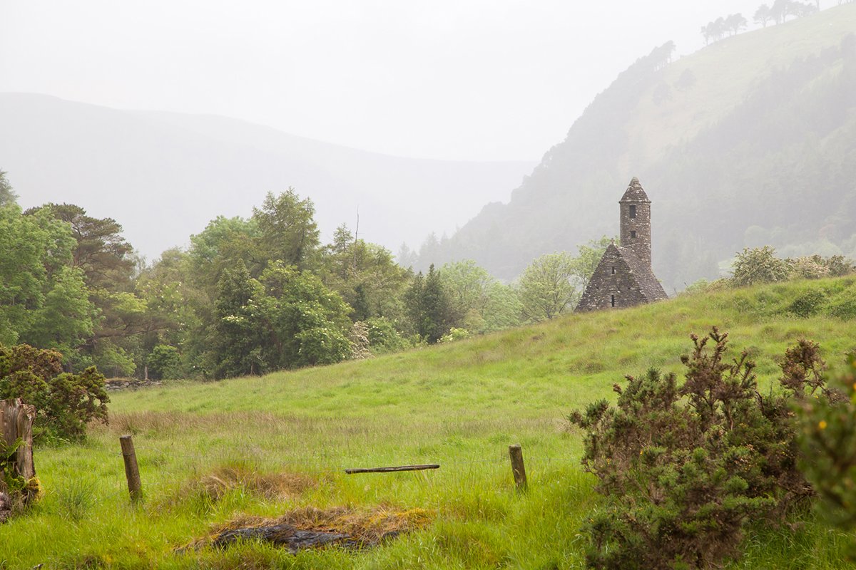 Field and Valley In Glendalough with Church and Round Tower 