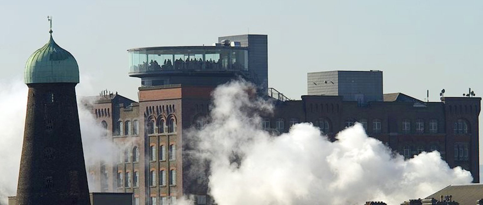 Guinness Storehouse Guinness storehouse with steam from the factory