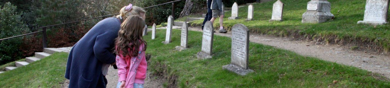 Two people looking at Pet's Cemetery in Powerscourt Estate